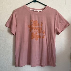 Pink “Be Groovy or leave Man” t-shirt